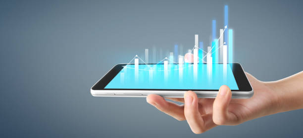 istock Graph growth and increase of chart positive indicators in his business, tablet in hand 1257316033
