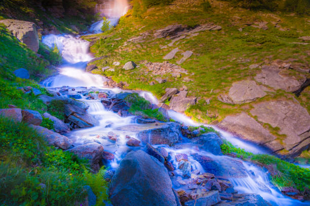 Ethereal falls – cascade landscape, long exposure – Gran Paradiso Alps – Italy