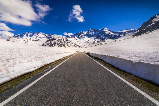 Nivolet pass: mountain Road between ice walls – Dolomites, Gran Paradiso, graian alps - Italy