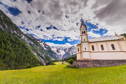 Church and Stilfs village in Idyllic landscape, near Passo dello Stelvio – South Tyrol alps, Italy