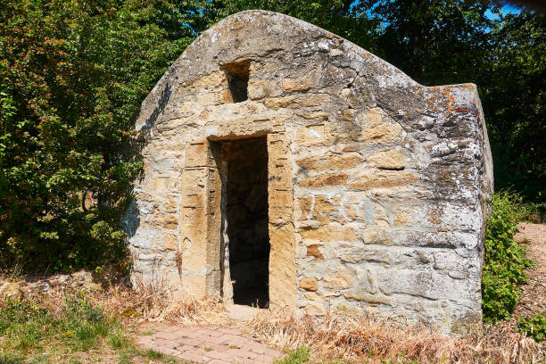 istock Abandoned stone house in agricultural field 1257325724
