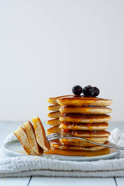 istock Homemade pancakes with drops of syrup 1257329393