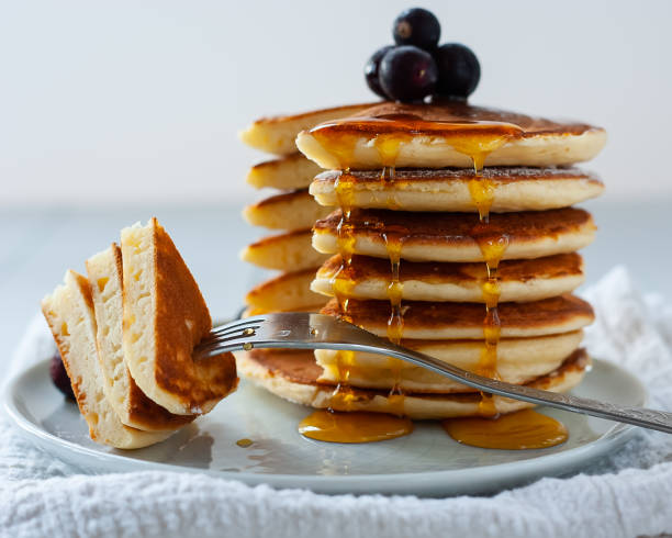 istock Homemade pancakes with drops of syrup 1257329406
