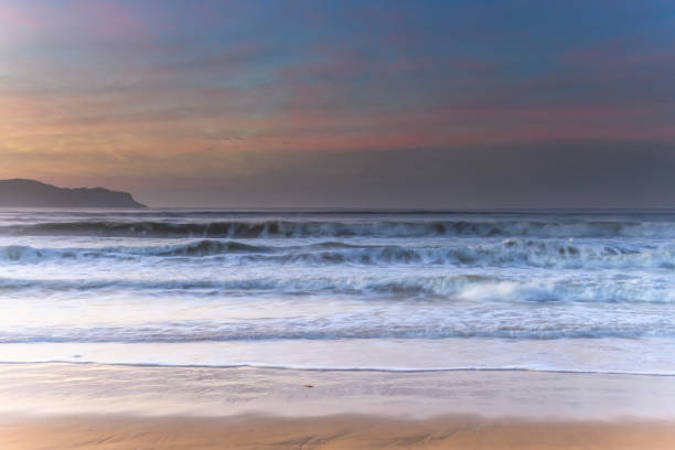 istock Light High Cloud Sunrise Seascape 1257335088