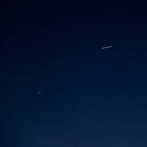 istock International Space Station passes the NEOWISE comet 1257335241