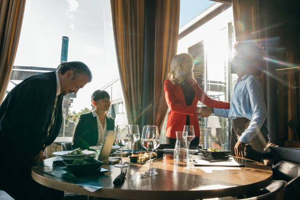 istock Business people meeting in a restaurant 1257337039