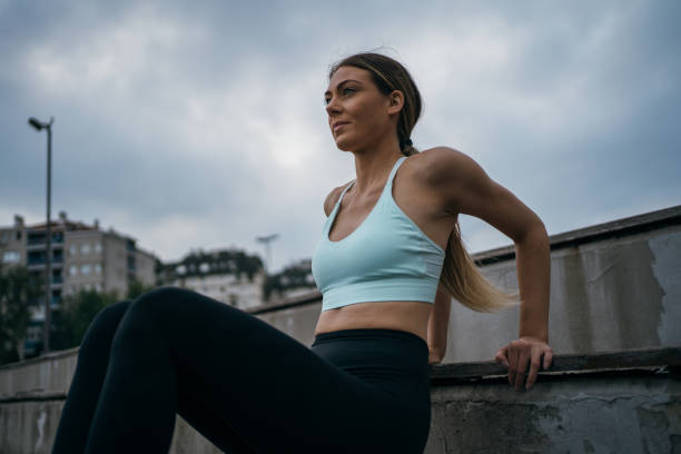 istock Active woman exercising outdoors 1257337817