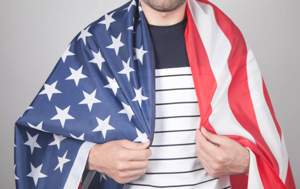 istock Caucasian man with a American flag. 1257338163