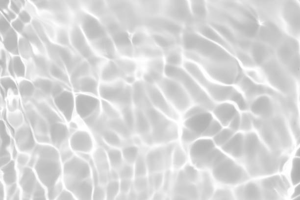 istock desaturated transparent clear calm water surface texture 1257338898