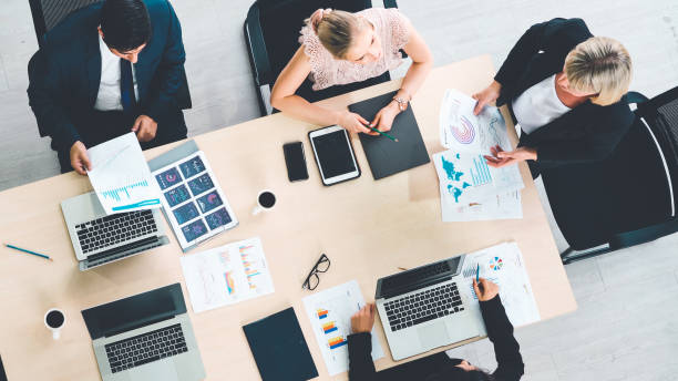 istock Business people group meeting shot from top view 1257338949