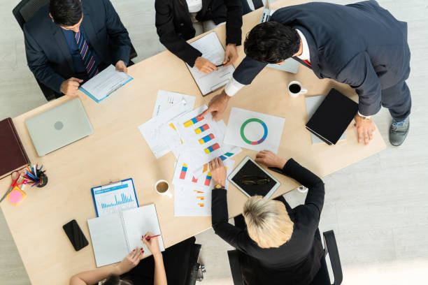 istock Business people group meeting shot from top view 1257338982