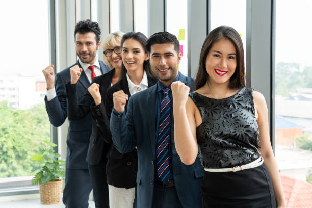 istock Successful business people standing together 1257342811