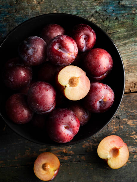 Plums, Fresh plums Plum, fruit, Purple, Agriculture, food and drink,  Sweet Food, food plum stock pictures, royalty-free photos & images