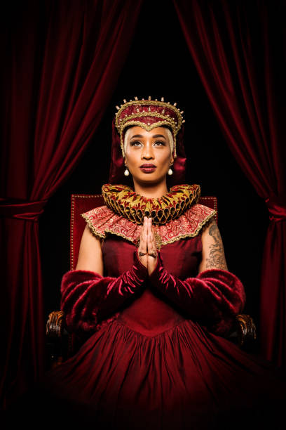 istock Historical mixed race Queen character on the throne 1257344197