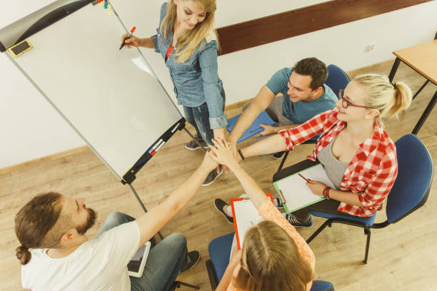 istock Group of people students working together 1257345682