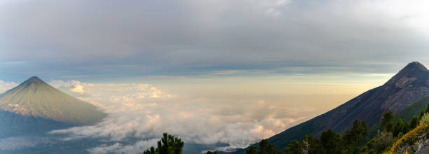 istock Aerial view of mountains during sunset above the clouds 1257346949