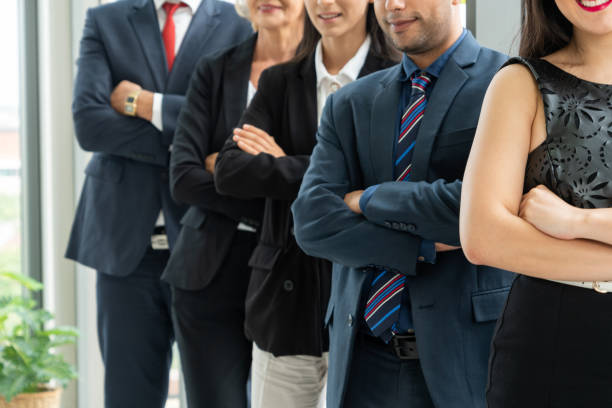 istock Successful business people standing together 1257348031