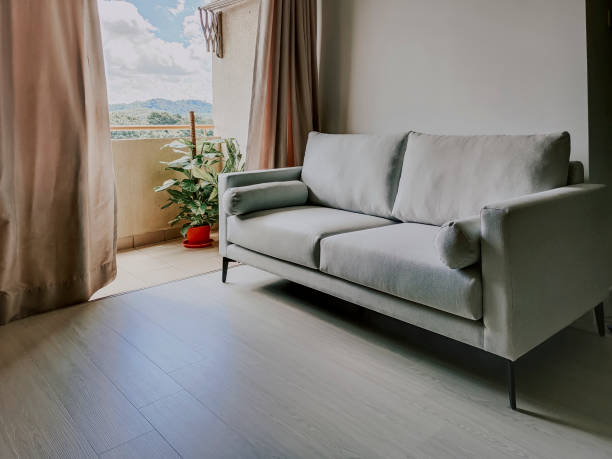 istock Living room with sofa and balcony potted plant 1257348549