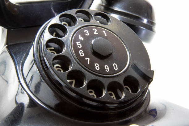 Detail monochrome view of old vintage dial telephone