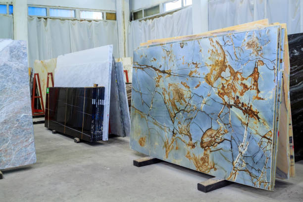 Colorful marble slabs in store show room. Quartzite slabs are prepared for sale in store yard stock photo