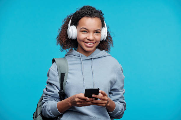 istock Cheerful black girl choosing track 1257354961