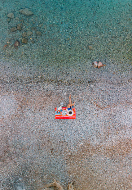 Aerial View Young Couple Enjoying the Summer at the Beach
