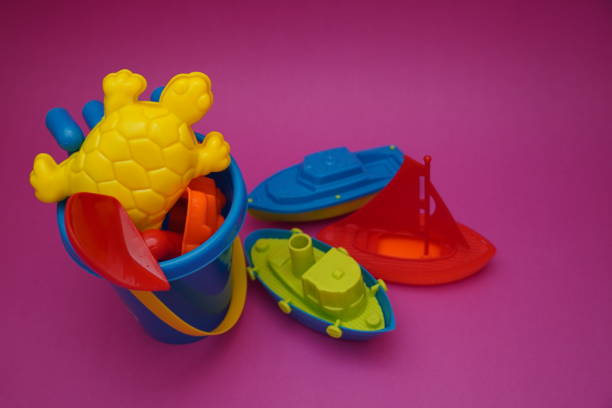 istock Bucket and beach accessories summer edition with boats 1257356810