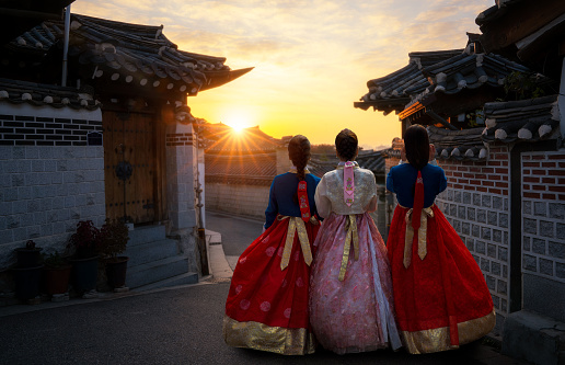 Korean girl in hanbok dress with morning at bukchon hanok village seoul city, south korea