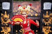 Balinese girl performing traditional dress in bali