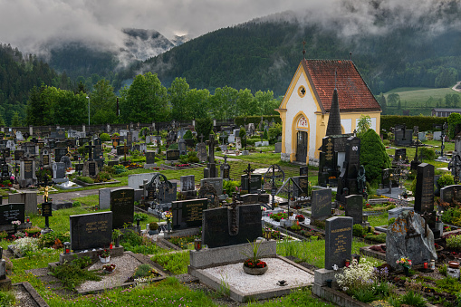 Mariazell, Austria - June 12, 2020: Graveyard of Mariazell on a cloudy day in summer