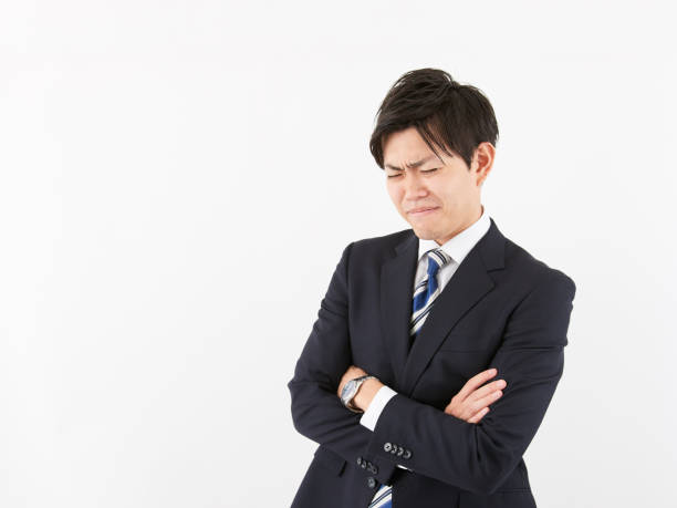Glaring Japanese male businessman