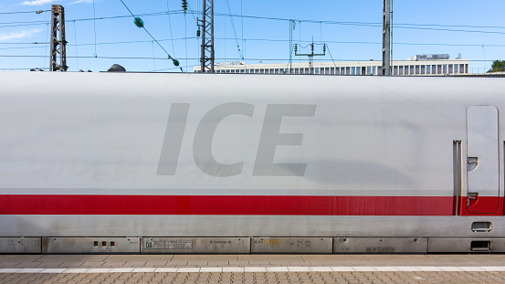 Munich, Bavaria / Germany - June 18, 2020: Close up / side view on the logo of Intercity Express (ICE) train. Belonging to the highspeed train network of Deutsche Bahn (DB).
