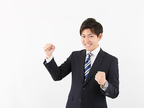 Japanese male businessman doing guts pose