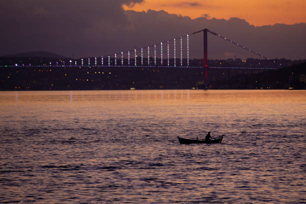 istock Fisher in Bosphorus Strait, Istanbul City, Turkey 1257359896