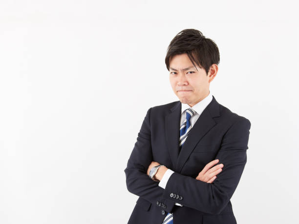istock Glaring Japanese male businessman 1257363912