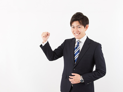 Japanese male businessman doing guts pose