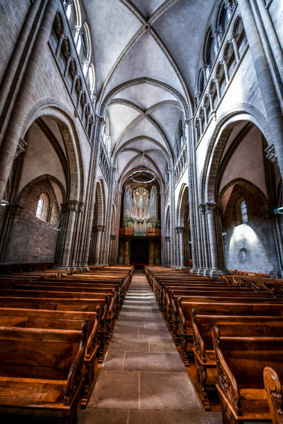 istock Two Rows Of Benches Inside St. Pierre's Cathedral In Geneva, Switzerland 1257366355