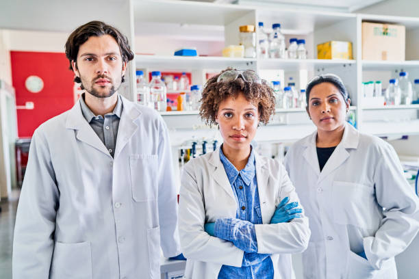 istock Diverse group of scientists working together in a lab 1257366557