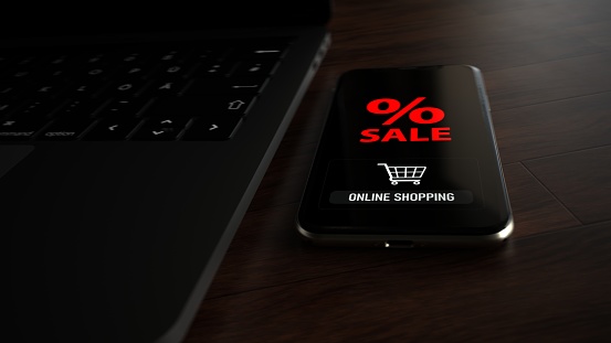 Smartphone with the text Sale Online Shopping on the wooden table with a notebook. 3d illustration.