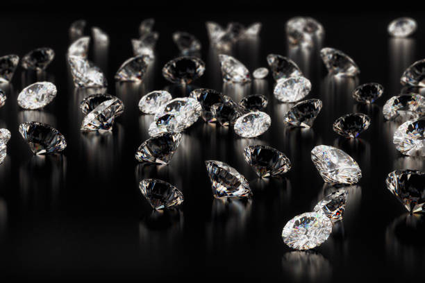 istock Large group of diamonds on black background. Close up image 1257368258