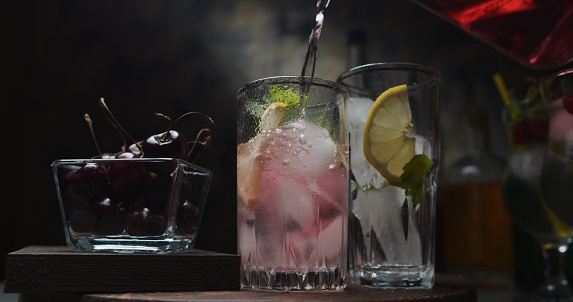 Ice mojito mocktail with fresh lemon and cherries