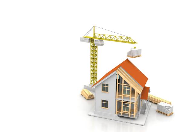 istock House 3d rendering illustration with open interior on top. Blueprints, documents, crane and mortgage calculations. 1257370944