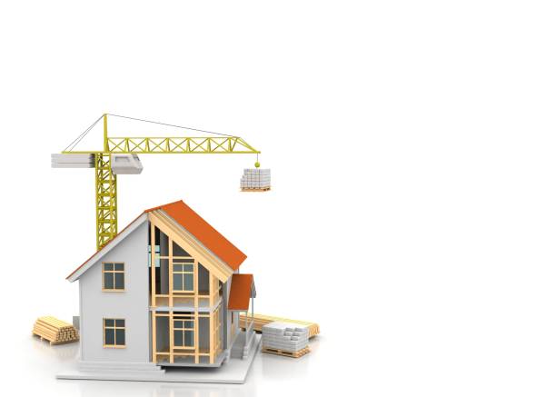 istock House 3d rendering illustration with open interior on top. Blueprints, documents, crane and mortgage calculations. 1257370985