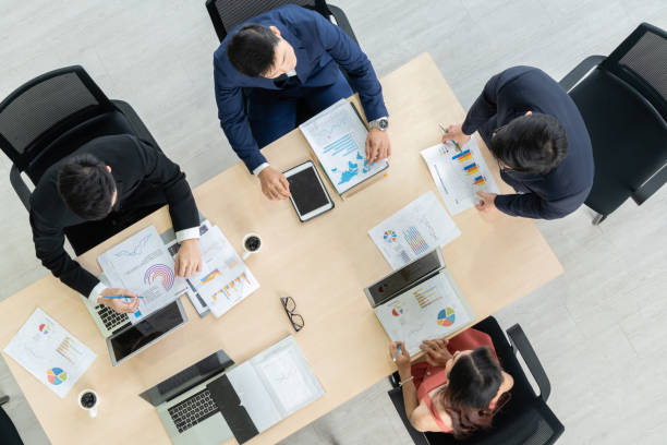 istock Business people group meeting shot from top view 1257372660