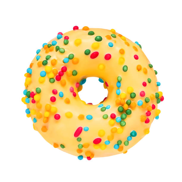 istock Yellow donut isolated over white background with clipping path. Top view, copy space 1257373880