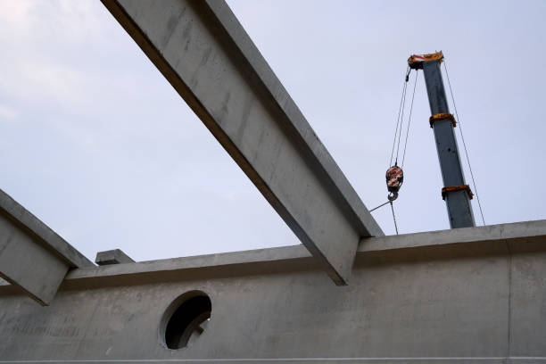 istock Installation of concrete beams on the structure 1257373924