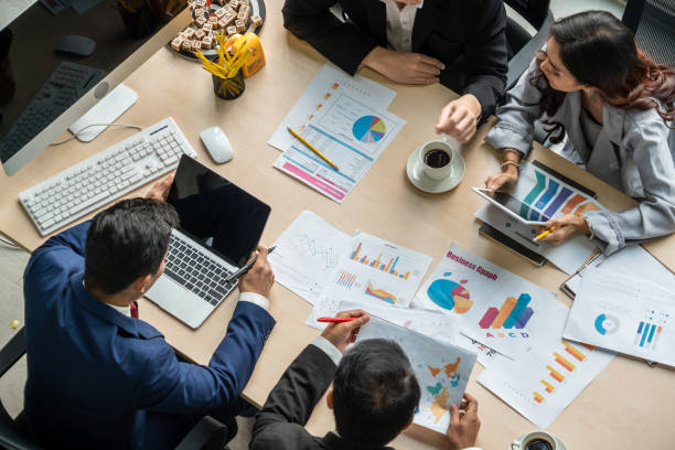 istock Business people group meeting shot from top view 1257373942