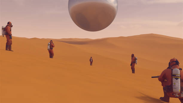 istock Large Alien Silver Sphere Floating above Desert Sand Dunes with People in Hazmat Suits Observing it 1257375365
