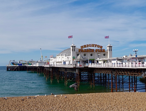 Eastbourne, UK - April 30, 2022: Pier is a seaside pleasure pier in Eastbourne, East Sussex, on the south coast of England.