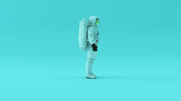 istock Astronaut with Gold Visor and White Spacesuit with Light Blue Background with Light Blued Lighting 1257378035